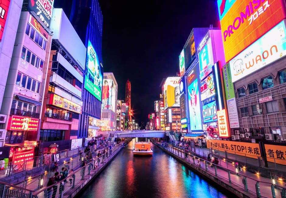 Dotonbori canal at night with neon reflections in Osaka