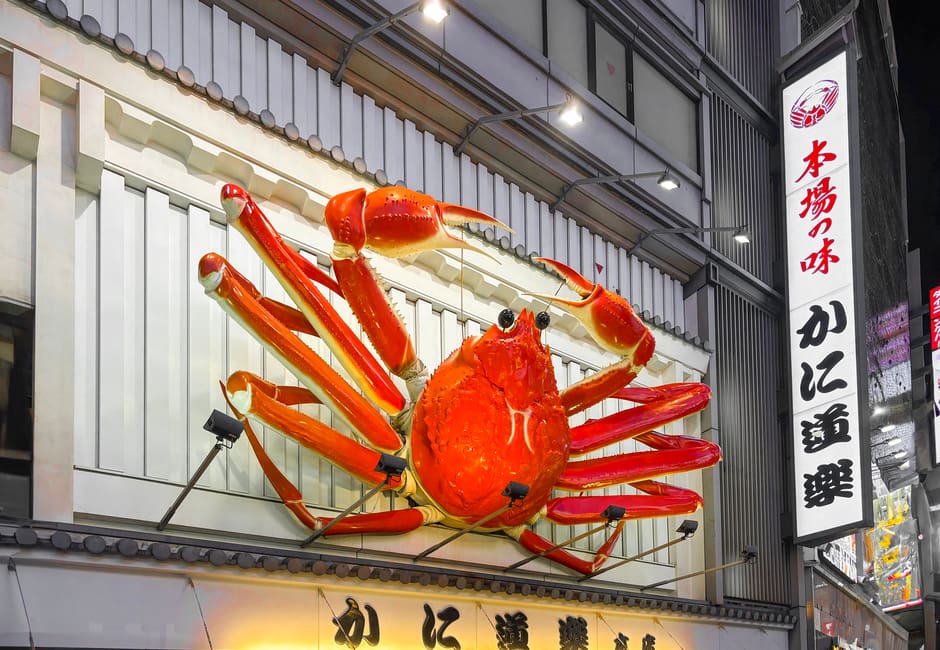 Giant mechanical crab sign above Kani Doraku Dotonbori Honten in Osaka