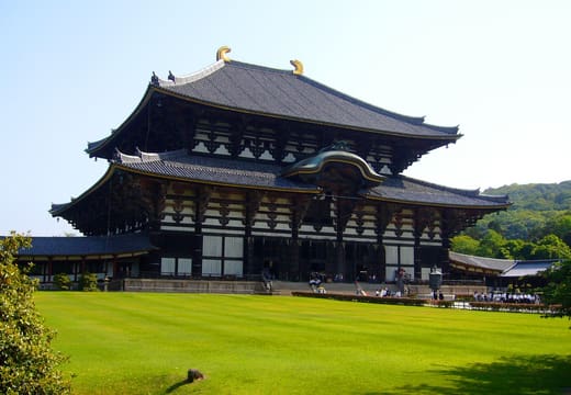 Todai-ji Great Buddha Hall seen across a lawn in Nara