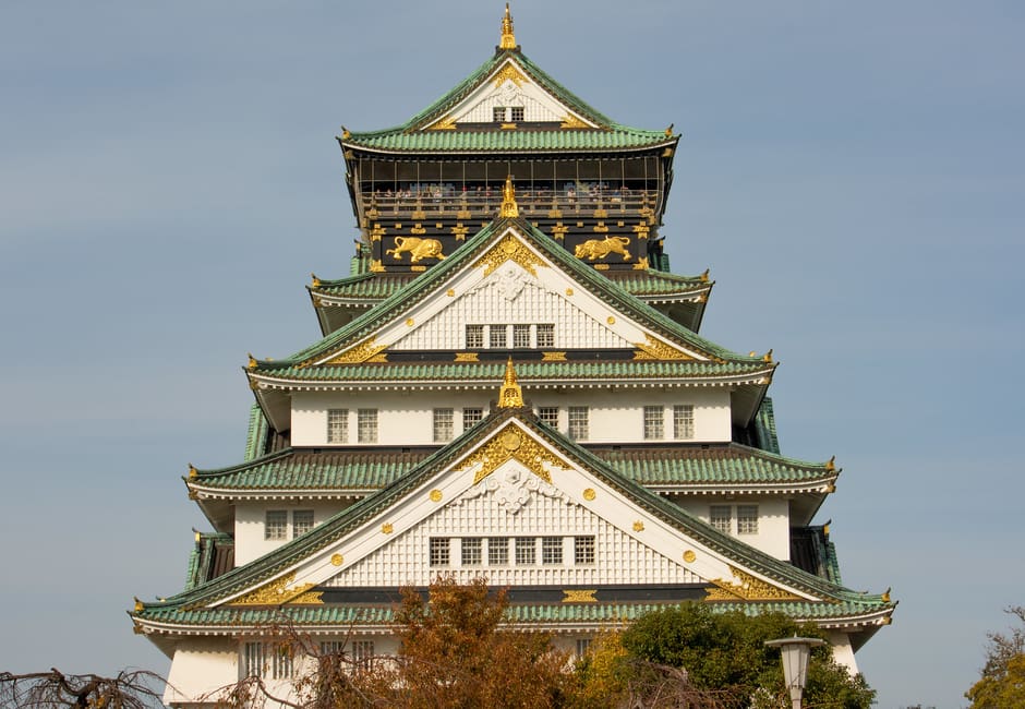 Osaka Castle main tower with green roofs and gold ornaments