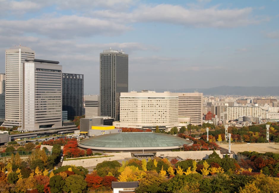 Domed Osaka-jo Hall with Osaka Business Park towers behind